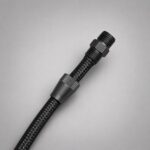 Hose end fitting installed open